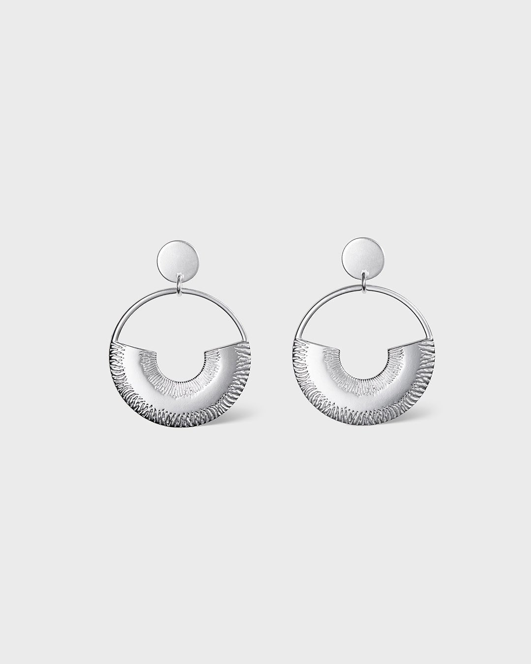 Kaaria earrings silver half pair left